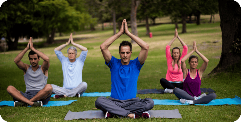 corporate wellness retreat yoga group