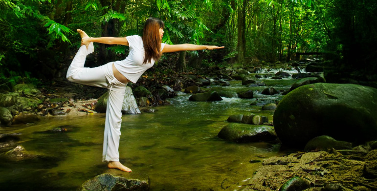 Woman balancing her body for Yoga asana