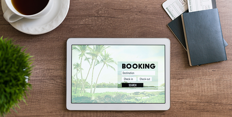 Traveler researching and booking a sustainable retreat in India online