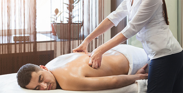 Ayurvedic Abhyanga massage with warm herbal oils for holistic healing