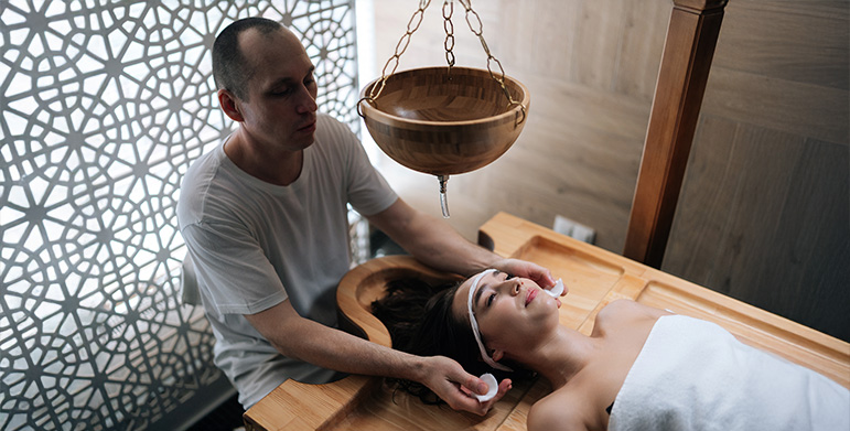 Shirodhara ritual for stress relief and mental calm