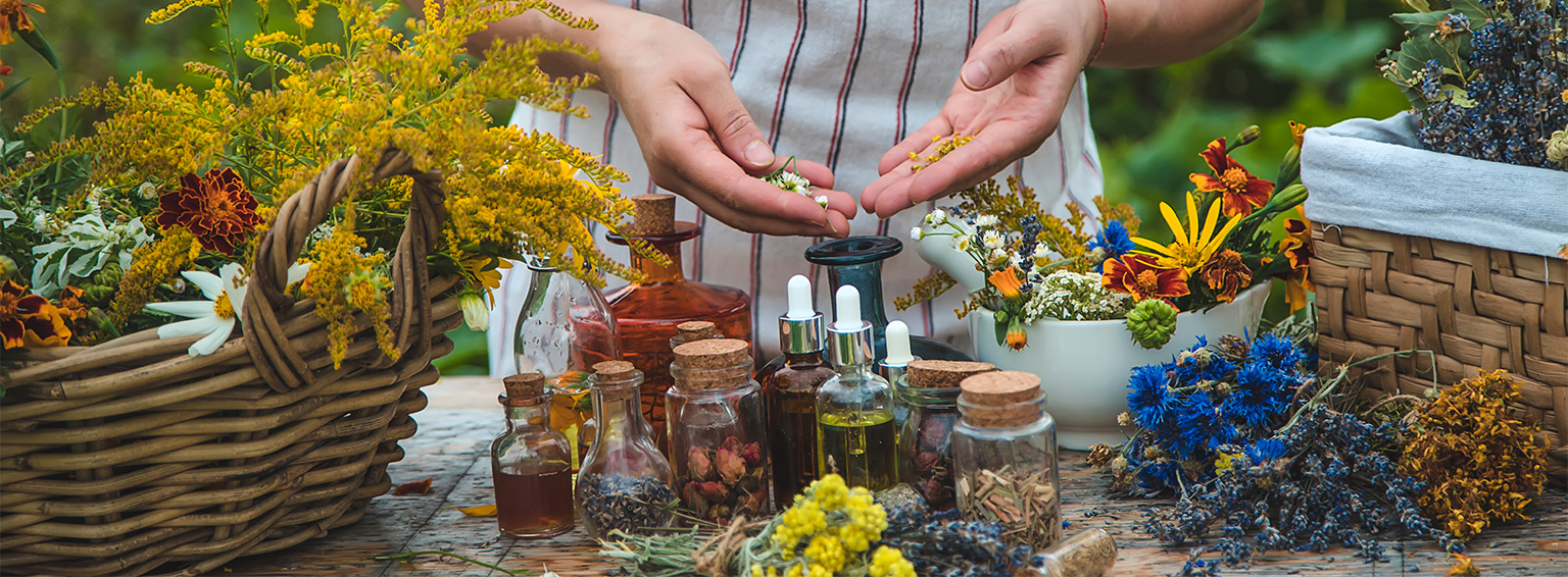 Ayurvedic healing setup with herbal oils, brass lamps, and natural ingredients used in traditional Ayurvedic rituals in India