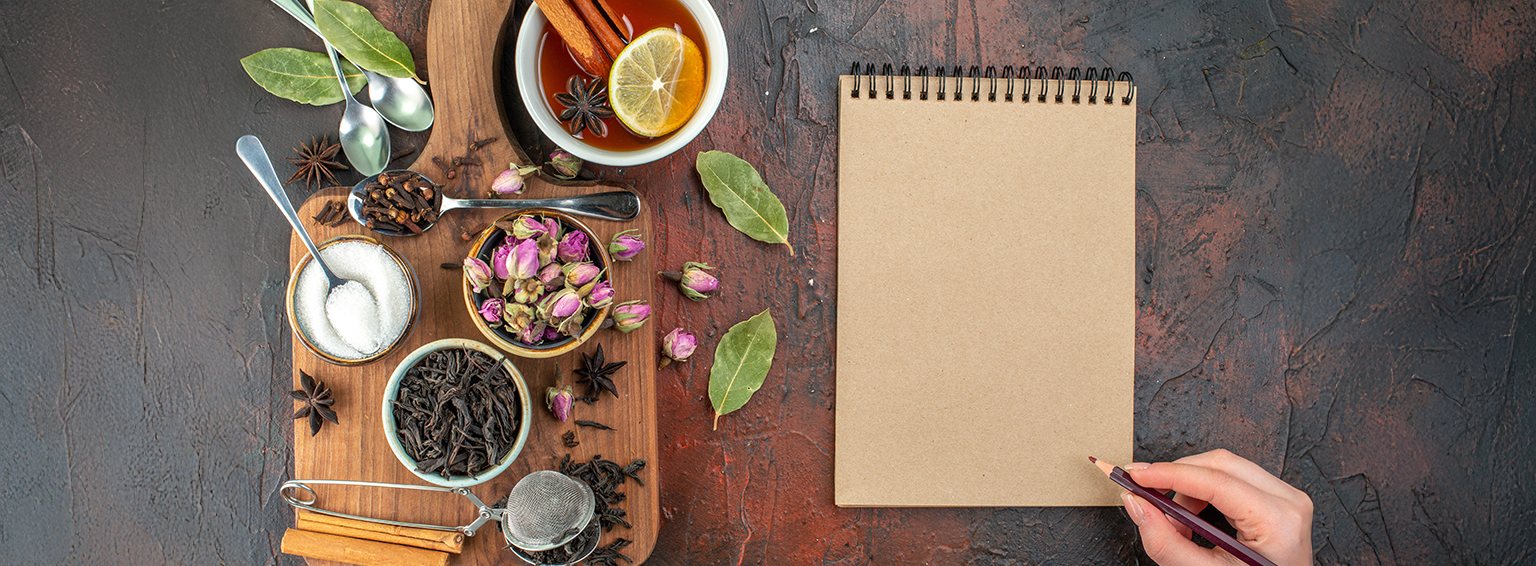 A serene outdoor dining setup with Ayurvedic thali — featuring kitchari, herbal teas, and seasonal vegetables served on banana leaves.