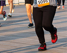 Standard Chartered Delhi Marathon February 2026 with runners competing across multiple distance categories in Delhi NCR